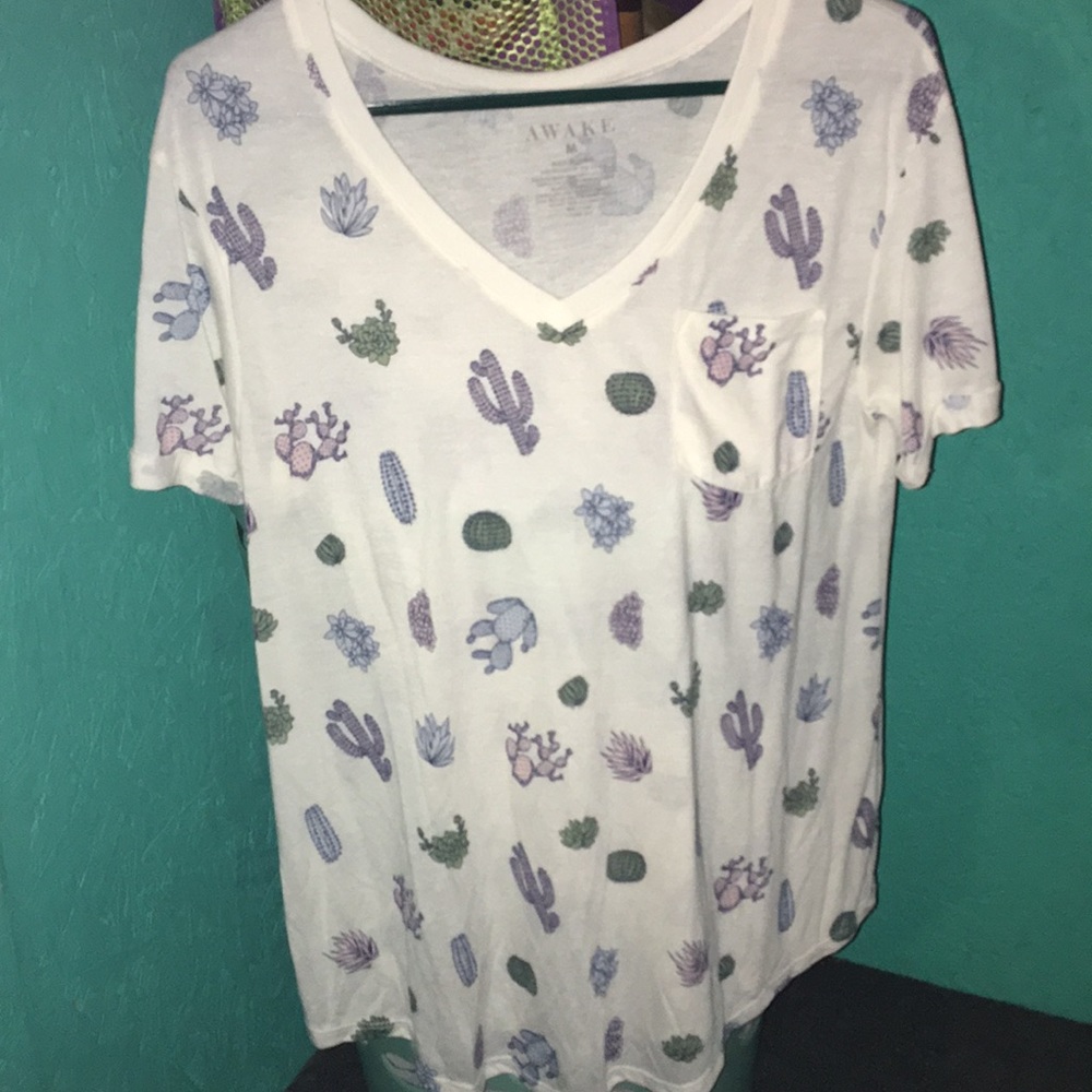 Creamer colored oversized tee shirt with pocket